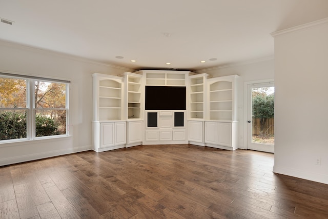 unfurnished living room with dark hardwood / wood-style flooring and crown molding