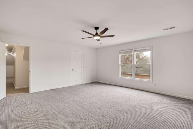 carpeted empty room with ceiling fan