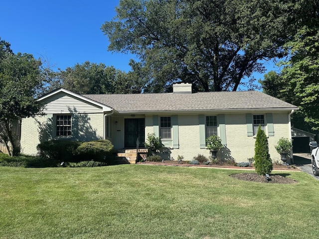 single story home with a front yard