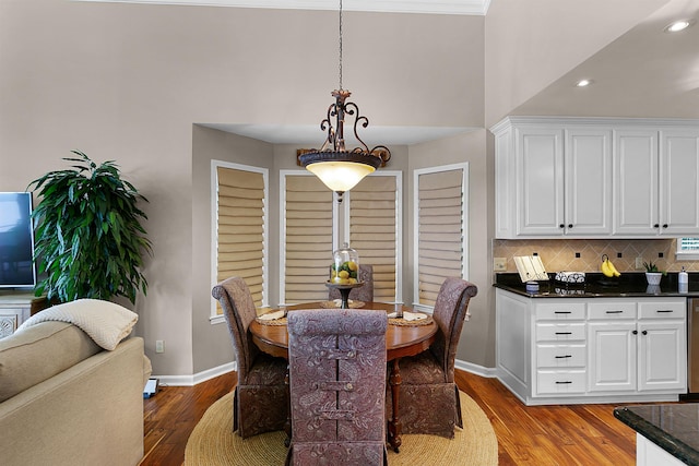 dining space with light hardwood / wood-style floors