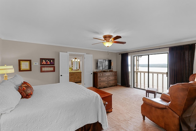 carpeted bedroom featuring ceiling fan, connected bathroom, crown molding, and access to outside