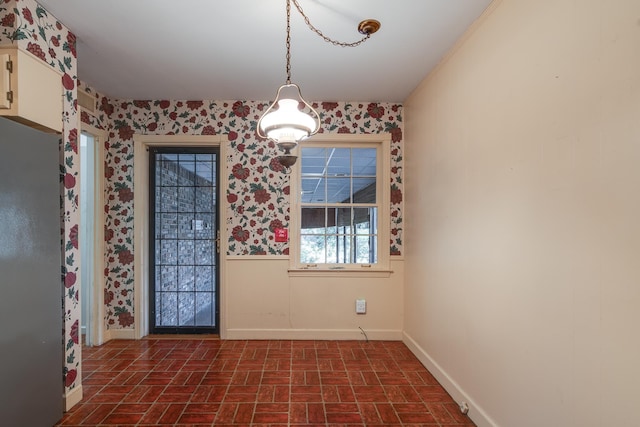 view of unfurnished dining area