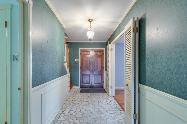 entryway with crown molding