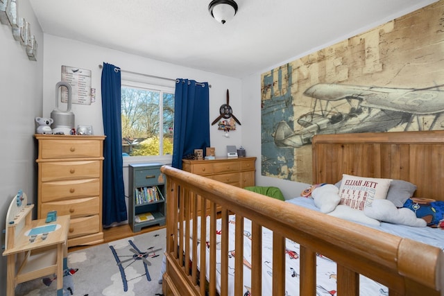 bedroom featuring wood-type flooring