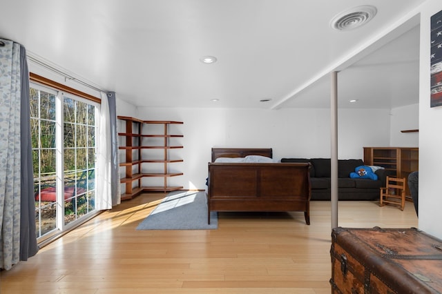 bedroom featuring light wood-type flooring