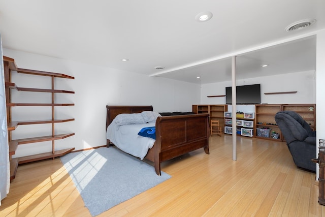 bedroom with light wood-type flooring