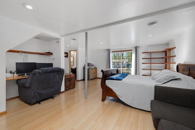 bedroom with light hardwood / wood-style floors