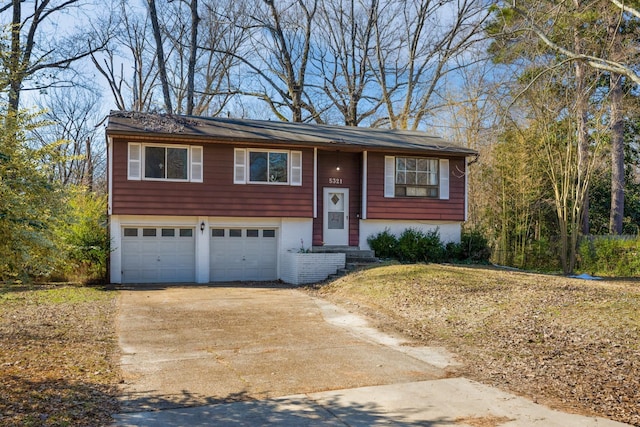 bi-level home with cooling unit and a garage