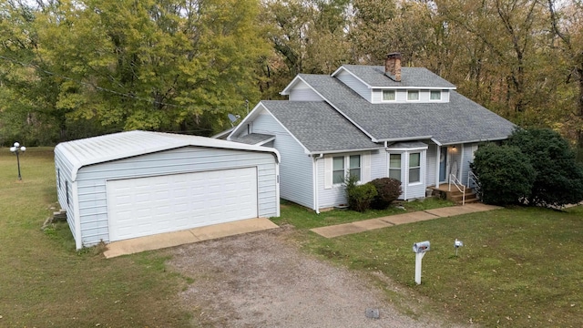 view of front facade featuring a front lawn and a garage