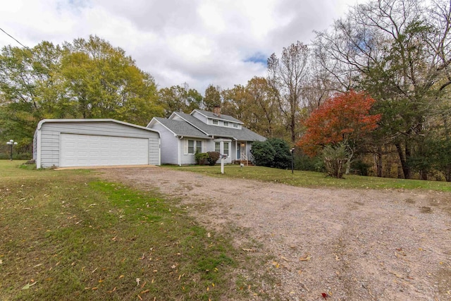 view of front facade featuring a garage and a front lawn