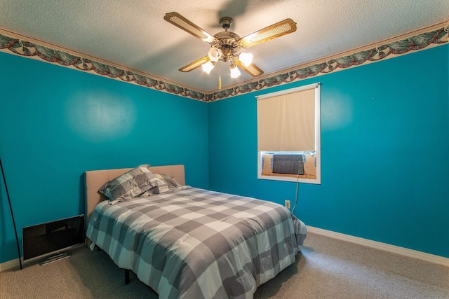 bedroom with ceiling fan, cooling unit, a textured ceiling, and carpet flooring