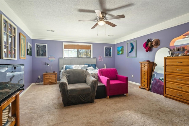 carpeted bedroom with ceiling fan, crown molding, and a textured ceiling