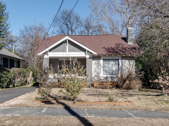 bungalow-style home featuring covered porch