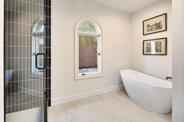 bathroom with independent shower and bath