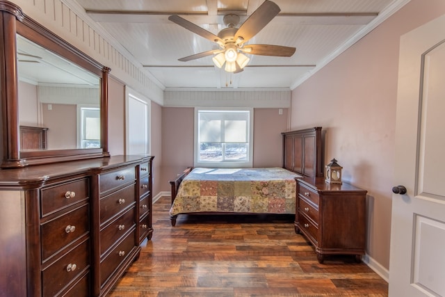 bedroom with ceiling fan, dark wood-type flooring, and ornamental molding