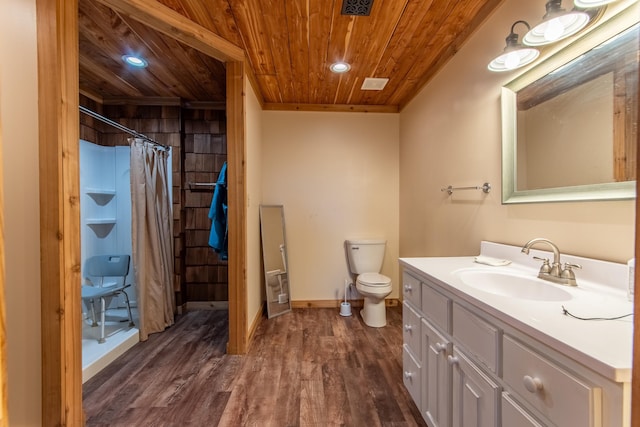 bathroom with toilet, hardwood / wood-style floors, wooden ceiling, vanity, and curtained shower