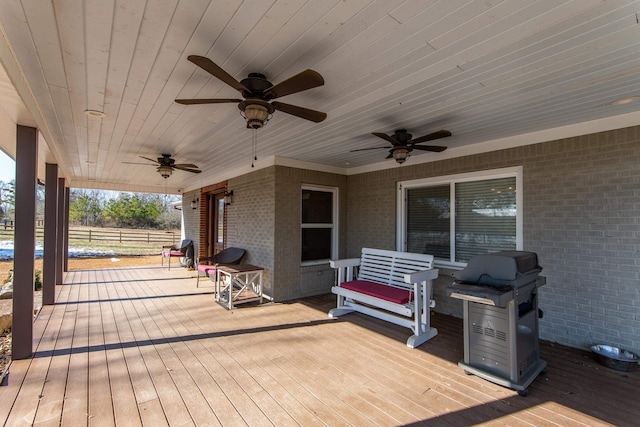 deck with ceiling fan and grilling area