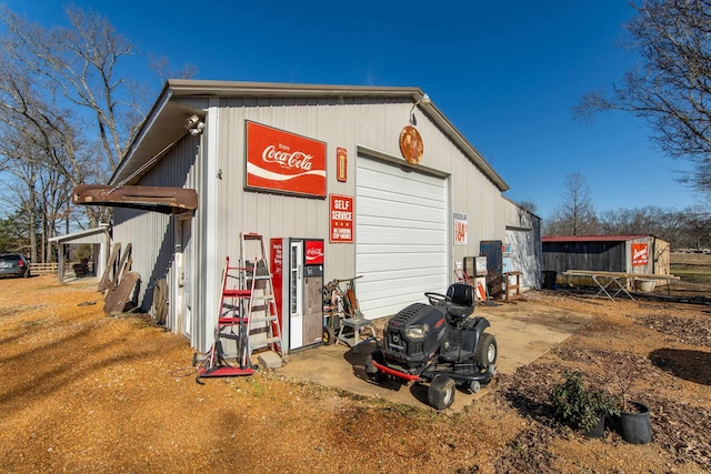 view of outdoor structure featuring a garage