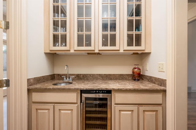 bar featuring wine cooler and sink