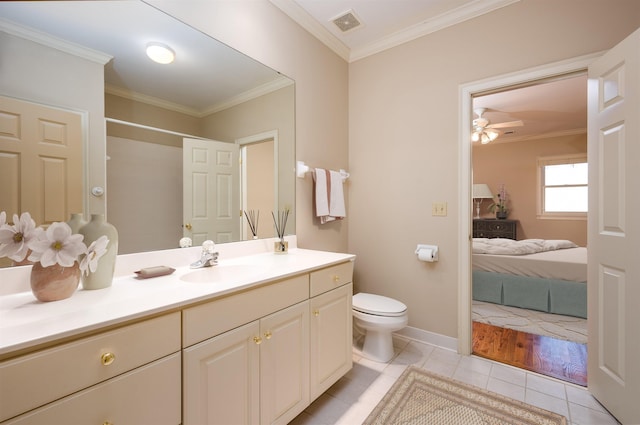 bathroom with ceiling fan, vanity, crown molding, and tile patterned flooring