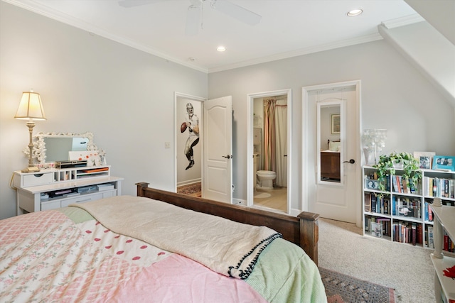 bedroom featuring ceiling fan, carpet, ensuite bathroom, and crown molding