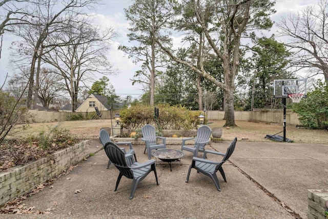 view of patio / terrace featuring an outdoor fire pit