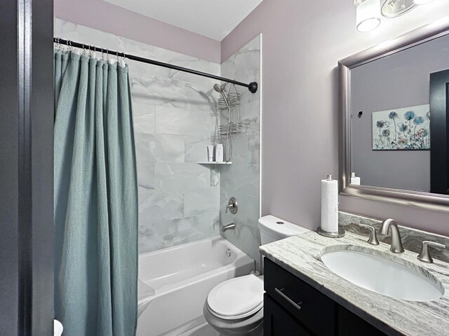 full bathroom featuring toilet, vanity, and shower / tub combo with curtain