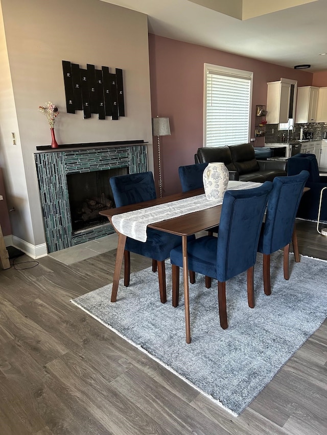 dining area with wood-type flooring