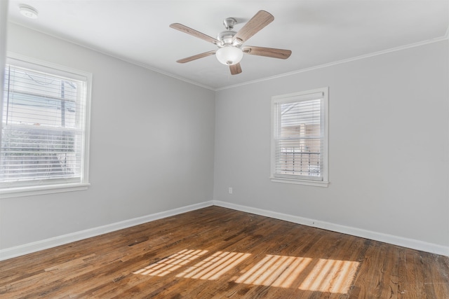 spare room with ceiling fan, wood-type flooring, and ornamental molding