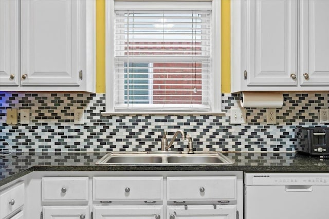 kitchen with white cabinetry, dishwasher, backsplash, and sink