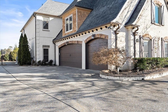 view of property exterior featuring a garage