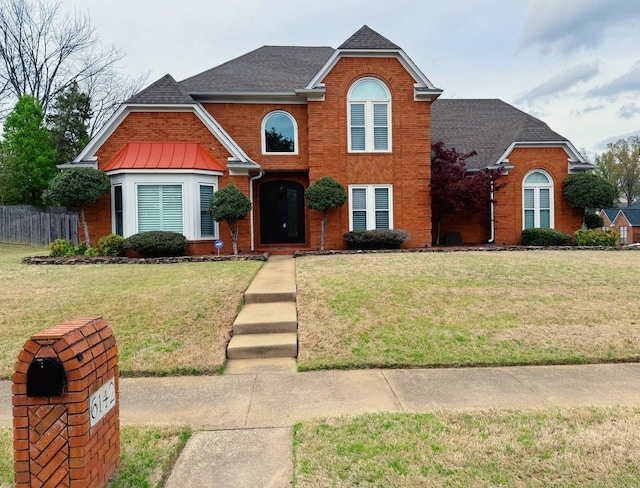 front of property featuring a front yard