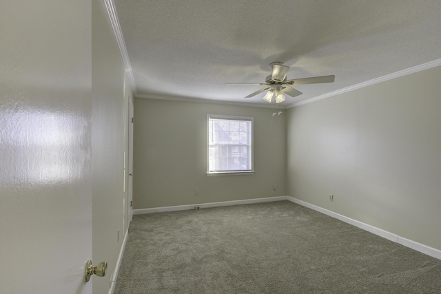 unfurnished room with carpet, ceiling fan, ornamental molding, and a textured ceiling