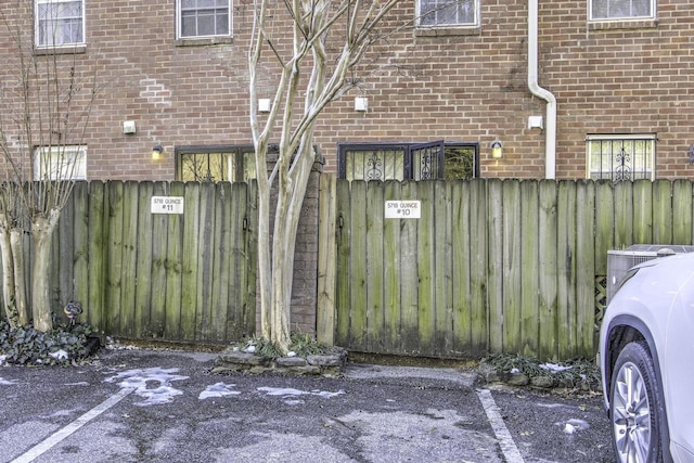 doorway to property featuring central AC unit