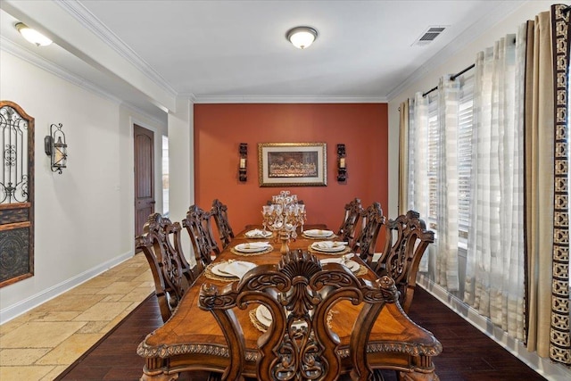 dining room with ornamental molding