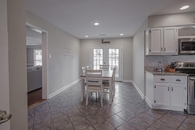 tiled dining area with french doors