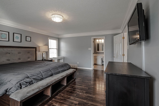 bedroom featuring ornamental molding, a textured ceiling, dark hardwood / wood-style flooring, and ensuite bath