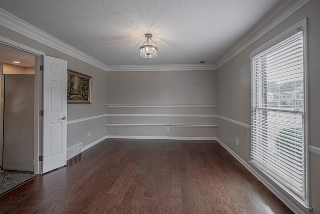 unfurnished room with dark wood-type flooring, a textured ceiling, and crown molding