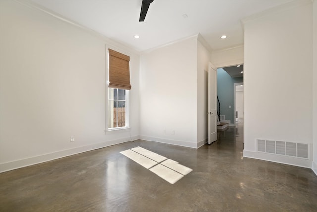 spare room with ceiling fan