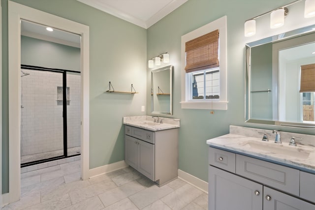 bathroom with an enclosed shower, vanity, ornamental molding, and tile patterned flooring