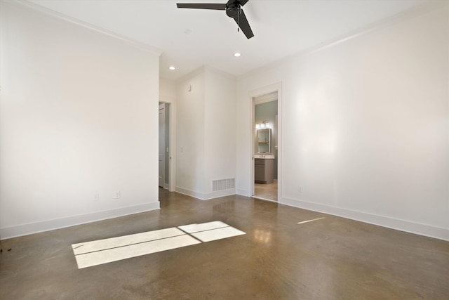 unfurnished room featuring ceiling fan and crown molding