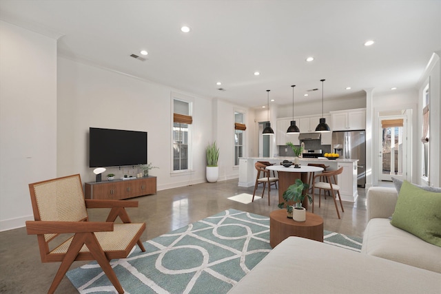 living room with crown molding