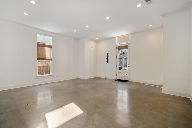 spare room featuring ornamental molding