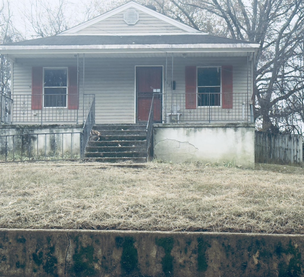 view of front of home featuring covered porch