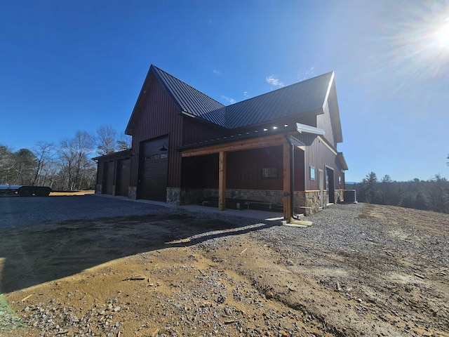 view of side of property featuring a garage