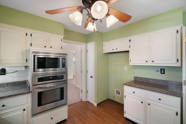 kitchen featuring ceiling fan, white cabinets, and appliances with stainless steel finishes