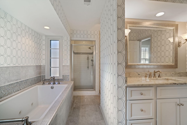 bathroom featuring vanity, separate shower and tub, and tile patterned flooring