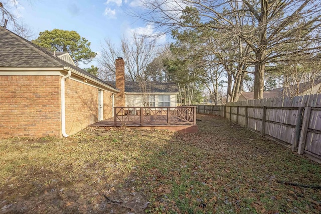 view of yard featuring a deck