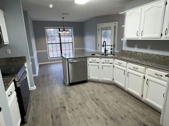 kitchen with pendant lighting, white cabinets, sink, kitchen peninsula, and stainless steel dishwasher