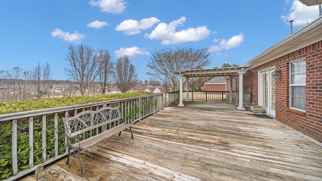 wooden terrace with a pergola